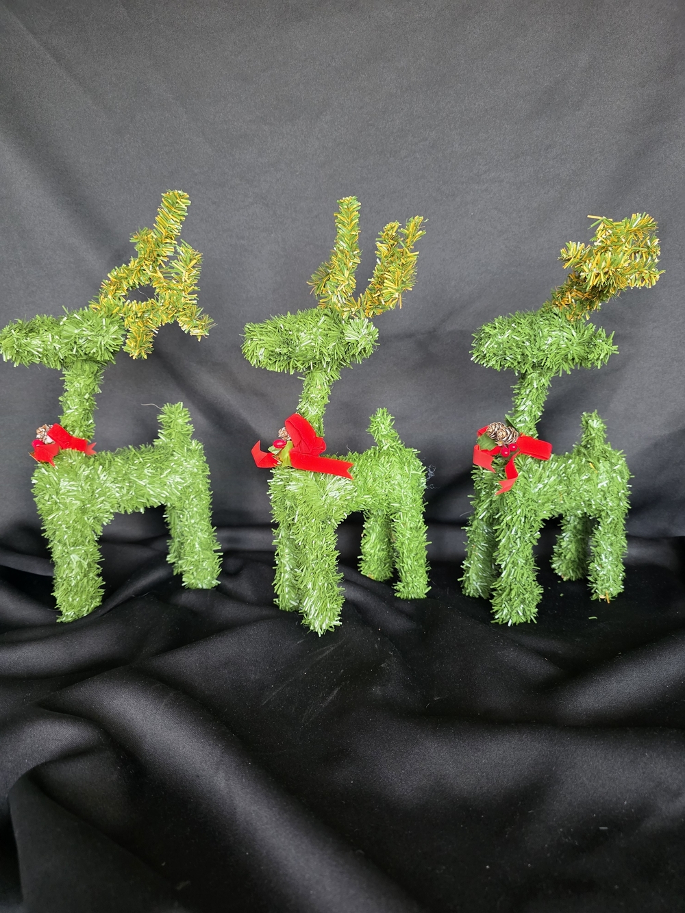 Holiday Green Artificial Pine Reindeer Trio with Red Bows - Abrand